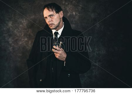 Retro 1920S English Gangster Holding Glass Of Whiskey. Peaky Blinders Style.