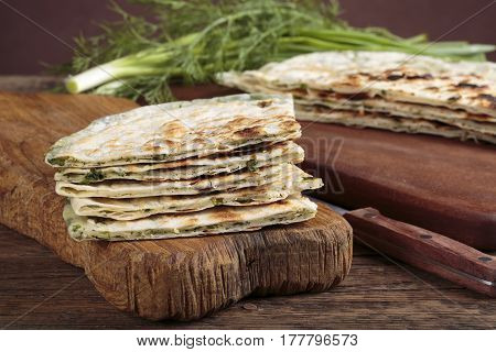 Scallion pancakes. Round unleavened flatbread minced green onions.