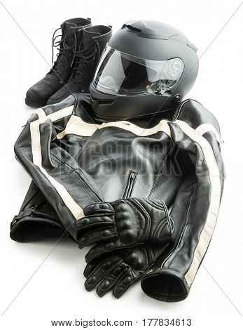 Motorcycle helmet, gloves, jacket and boots isolated on white background.