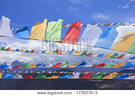 Scenery of Meili snow mountain with prayer flags at the gate of Deqing city Yunnan China