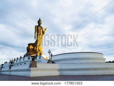 Big Buddhist statue at phutthamonthon over cloudy day, Thailand