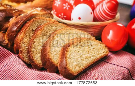 Easter Traditional Bread And Eggs On Wooden Background