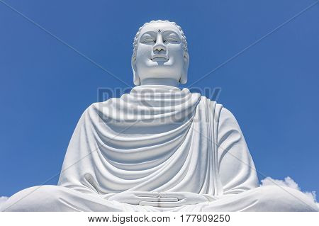 White Buddha Statue at Long Son Pagoda in sunny day at Nha Trang Vietnam