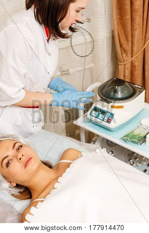 Plazmolifting in a beauty salon. Machine cosmetology. Spa. Skin rejuvenation.