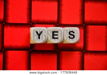 word yes on a  abstract colorful background