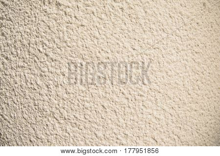 Vintage and grunge gold, cream or beige background of natural cement or stone old texture , retro pattern wall. Conceptual or metaphor wall banner, material, aged, solid website background.