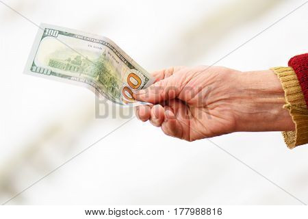 Senior Womans Hand Give Away Money