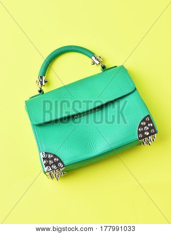 Small Womans Leather Green Bag With Metallic Spikes On Yellow