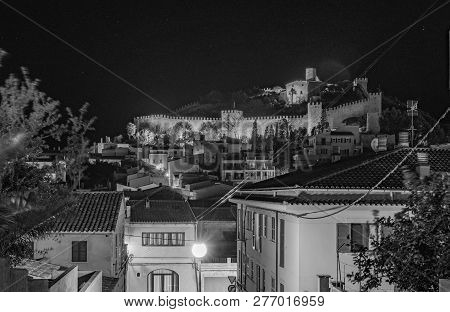 Spain Majorca, Beautiful View Of The Old Mediterranean Town Of Capdepera At Night