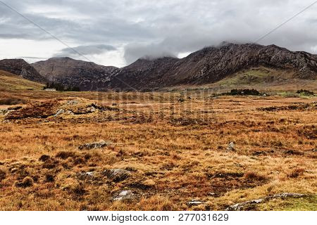 Clouds Over Mountains In Conemara