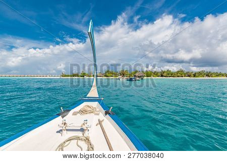 Perfect Summer Holiday Concept In Maldives Island. Dhoni Boat In Blue Sea Heading Over Tropical Beac