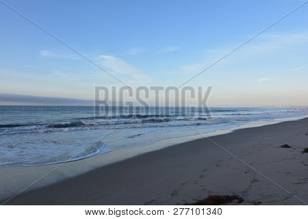 Footprints Covering Parts Of The Sandy Beach
