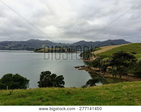 The Beautiful Country Side And A View Of Latham Bay On The Otago Peninsula, Outside Of Dunedin, New 