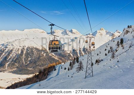 Cable Cars In A Ski Area In The Swiss Alps.