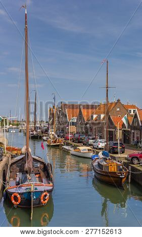 Monnickendam, Netherlands - August 25, 2017: Canal With Wooden Sail Boats In Monnickendam, Holland