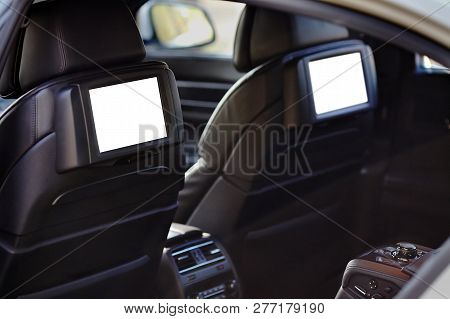 Car Inside Headrest Screen Mock Up. Interior Of Prestige Luxury Modern Car. Two White Displays For B