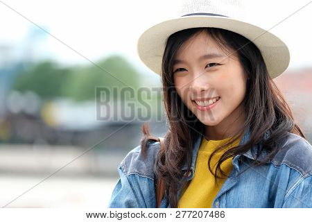 Young Asian Woman Portrait Smiling With Happiness At City Outdoors Background, Casual Lifesyle, Trav