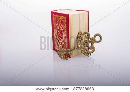 Retro Key And Islamic Holy Book Quran In Mini Size