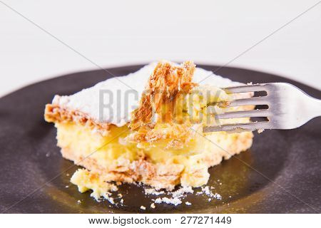 Napoleonka Cake - A Polish Type Of Cream Pie - Sprinkled With Powdered Sugar, Eaten With A Fork