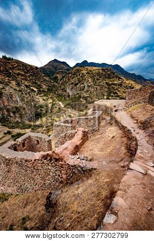 Amazing mountanious Pisac lsndscape with stony constructions in Peru