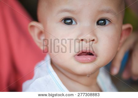 Cute Baby Dribbling - The Face Baby Girl Asia  Child Kid Girl Looking And Dribbling