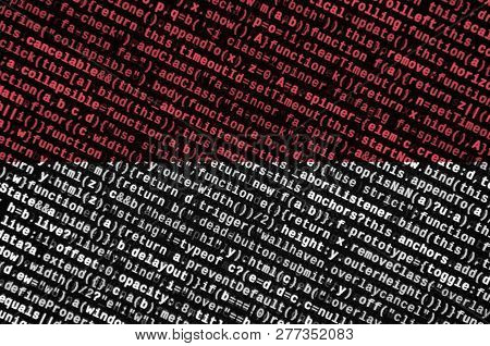Indonesia Flag  Is Depicted On The Screen With The Program Code. The Concept Of Modern Technology An