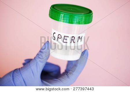 Health. Sperm Analysis. Concept Of Bank Sperm. Infertility. Doctors Hand Holding Container For Analy