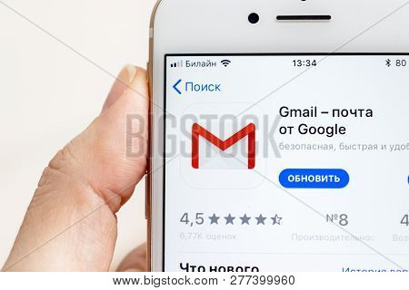 Moscow, Russia - January 08, 2018: Hand Holding Apple Iphone 7s With Google Gmail Application Icon. 