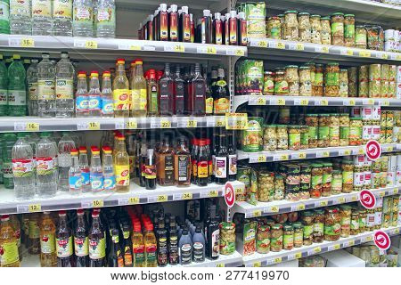 Kyiv / Ukraine. 28 September 2018: Canned Mushrooms And Vinegar On Shelves Of Supermarket Store. Can