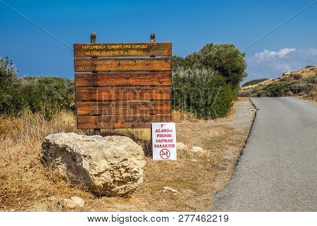 October 2015, Girne, Northern Cyprus - Wooden Sign With Rules Of How To Behave On A Alagadi Turtle B