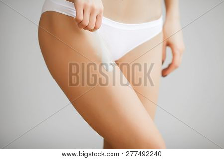 Long Woman Legs With Beautiful Soft Skin. Beauty Body Care