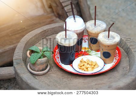 Serving Four Cups Of Coffee With A Cookie On The Thai Enamel Ware Zinc Tray.
