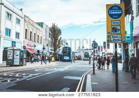Brighton, England-1 October,2018: Bus Stop With Digital Data Board Information Sign For Passenger Wi