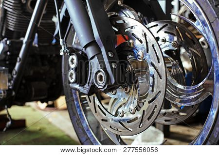 Cropped Close Up Shot Of Beautiful And Custom Made Motorcycle In The Workshop