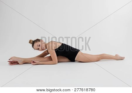 Beautiful Young Woman Limber Exerciser In The Studio