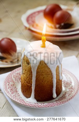Easter Composition With Easter Cake And Easter Eggs On A Wooden Background. Rustic Style.