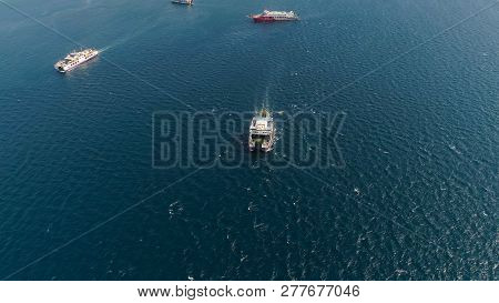 Public Ferry Ships Carrying Passengers From Gilimanuk Harbour Ferry Port In Bali Island To Ketapang 