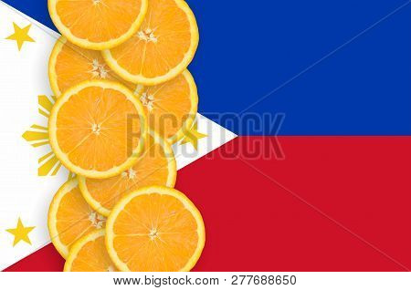 Philippines Flag And Citrus Fruit Slices Vertical Row