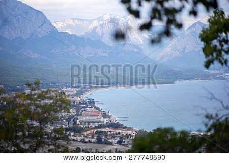 Panoramic View From The Mountain Of The City Of Kemer In Turkey. Mountains, Sea, Clouds, Lagoon