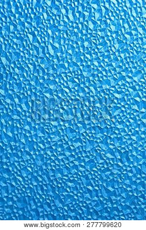 Abstract Polygonal Pattern On A Blue Plastic Window On The Lumen