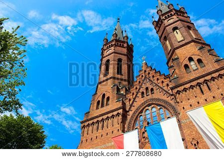 Tarnow, Poland - May 01, 2014: Exterior Of The Gothic Catholic Church Of The Holy Family