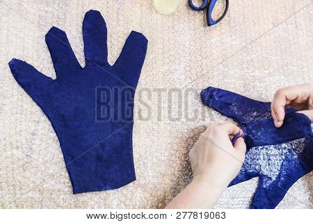 Workshop Of Hand Making A Fleece Gloves From Blue Merino Sheep Wool Using Wet Felting Process - Craf