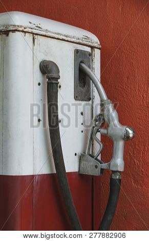 Old Oil Gasoline Dispenser White Color, Obsolate Technology.