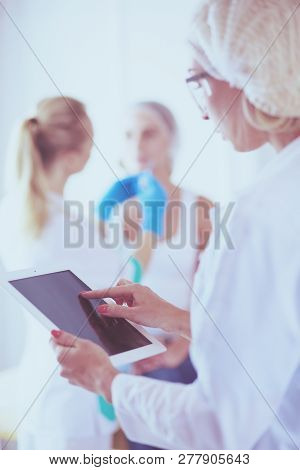 Portrait Of Female Standing Near Open Fridge Full Of Healthy Food, Vegetables And Fruits. Portrait O