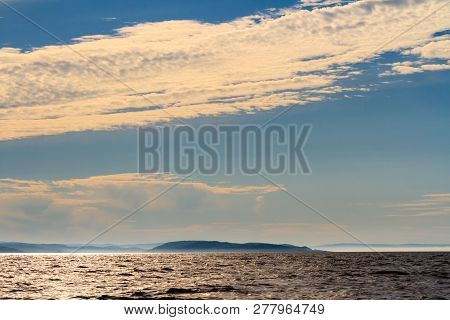 Small Island In Barents Sea On The Sunset. Arctic Ocean, Kola Peninsula, Russia