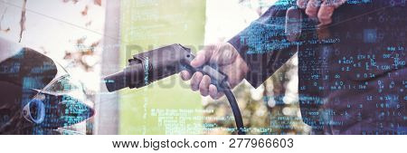 Blue codes against man charging electric car at charging station