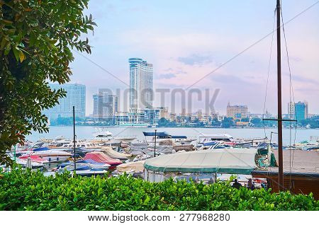 The Cairo Yacht Club At The Nile Bank Of Giza With The Housing Of Rhoda Island On The Background, Eg