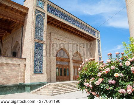 View Of The Khast Imam Mosque Through The Bushes With Roses. Tashkent, Uzbekistan. Apr 29, 2019.
