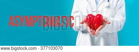 Asymptomatic Theme With A Doctor Holding A Heart On A Blue Background