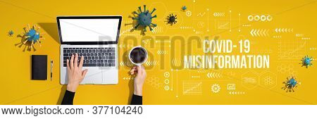 Covid-19 Misinformation Theme With Person Using A Laptop Computer